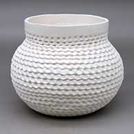 A corrugated white jar with a short neck
 by Jackie Shutiva of Acoma