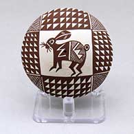 Click for a larger view A black on white seed pot decorated with an ancient Mimbres rabbit, fineline and geometric design
by Diane Lewis of Acoma