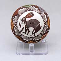 Click for a larger view A polychrome seed pot decorated with an ancient Mimbres rabbit, fineline and geometric design
by Diane Lewis of Acoma