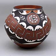 A polychrome jar decorated with a renewed design from 1885
 by Lilly M Salvador of Acoma