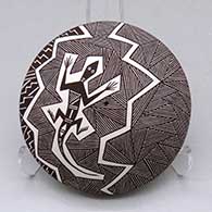 A black on white seed pot decorated on top with a lizard, fineline and geometric design
 by Rebecca Lucario of Acoma