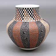 A polychrome jar decorated around the body with columns of tiny square geometric design and with a band of polychrome checkerboard design around the neck
 by Frederica Antonio of Acoma