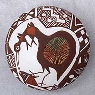 A polychrome seed pot decorated with a cloudeater, fish, fineline and geometric design
 by Diane Lewis of Acoma