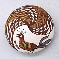 A polychrome seed pot decorated with a bird, plant, fineline and geometric design
 by Diane Lewis of Acoma