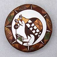 A polychrome seed pot decorated with a cloudeater, fish, fineline and geometric design
 by Diane Lewis of Acoma