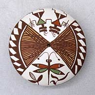 A polychrome seed pot decorated with a dragonfly, pueblo dancers, fineline and geometric design
 by Diane Lewis of Acoma
