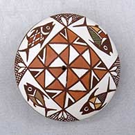 A polychrome seed pot decorated with a fish and geometric design
 by Diane Lewis of Acoma