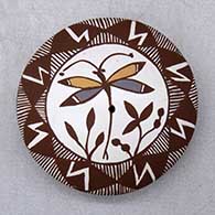 Click for a larger view A polychrome seed pot decorated with dragonfly, plant, lightning bolt, fineline and geometric design
by Diane Lewis of Acoma