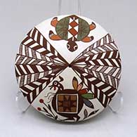A polychrome seed pot decorated with a turkey, turtle, basket weave and geometric design
 by Diane Lewis of Acoma