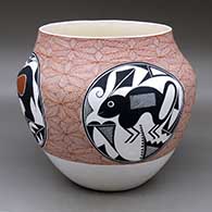 A polychrome jar decorated with medallions enclosing rabbits, bears and geometric designs in a snowflake fineline background
 by Adrian Trujillo of Acoma