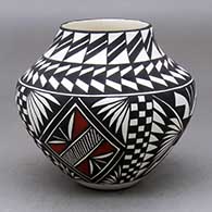 A polychrome jar decorated with a medallion, checkerboard, kiva step and geometric design
 by Sandra Victorino of Acoma