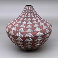 A polychrome tear drop jar decorated with bands of fineline and geometric design
 by Sandra Victorino of Acoma