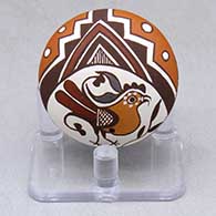 A miniature polychrome seed pot decorated with a parrot, branch and geometric design
 by Diane Lewis of Acoma