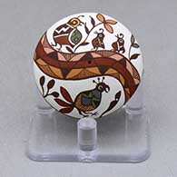 A miniature polychrome seed pot decorated with a bird, plant, rainbow, fineline and geometric design
 by Diane Lewis of Acoma