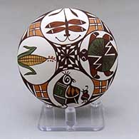 A polychrome seed pot decorated above the shoulder with a turtle, quail, dragonfly, ear of corn and geometric design
 by Diane Lewis of Acoma