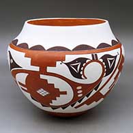 A large polychrome jar decorated with a four panel rainbird, bird element, kiva step, cloud and geometric design
 by Franklin Peters of Acoma