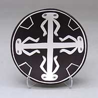 A black on white plate decorated with a four panel ancient Mimbres design
 by Emma Lewis of Acoma