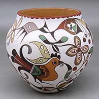A polychrome jar decorated with a parrot, cloudeater, fish, quail, other birds, flowers and geometric design
 by Diane Lewis of Acoma