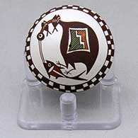 A miniature polychrome seed pot decorated with a cloudeater, fish, checkerboard and geometric design
 by Diane Lewis of Acoma