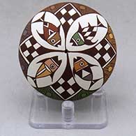 A polychrome seed pot decorated above the shoulder with a four panel fish, checkerboard, fineline and geometric design
 by Diane Lewis of Acoma