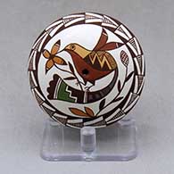 A polychrome seed pot decorated above the shoulder with a hummingbird, plant, flower and geometric design
 by Diane Lewis of Acoma