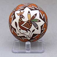 A polychrome seed pot decorated above the shoulder with a bird, branch and geometric design
 by Diane Lewis of Acoma