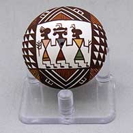 A miniature polychrome seed pot decorated with a women dancer, fineline and geometric design
 by Diane Lewis of Acoma