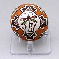 A miniature polychrome seed pot decorated with a dragonfly, kiva step, rainbow, fineline and geometric design
 by Diane Lewis of Acoma