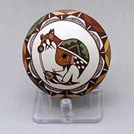 A polychrome seed pot decorated with a cloudeater, fish, rain cloud and geometric design
 by Diane Lewis of Acoma