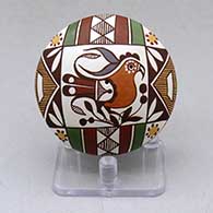 A polychrome seed pot decorated with a parrot, plant and geometric design
 by Diane Lewis of Acoma