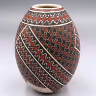 Polychrome jar with a 3-panel cuadrillos and geometric design
 by Tati Ortiz of Mata Ortiz and Casas Grandes