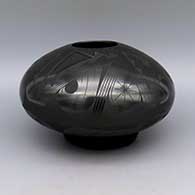 Black-on-black jar with geometric design
 by Octavio Andrew of Mata Ortiz and Casas Grandes