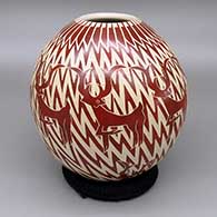 Red and white jar with a sgraffito antelope and geometric design
 by Leonel Lopez Sr of Mata Ortiz and Casas Grandes