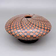 Polychrome jar with a cuadrillos geometric design
 by Yoly Ledezma of Mata Ortiz and Casas Grandes