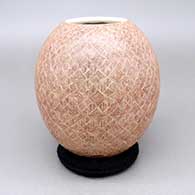 Red jar with a sgraffito fineline geometric design
 by Abel Lopez of Mata Ortiz and Casas Grandes