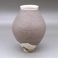 Click for a larger view A polychrome jar with a flared lip and decorated with a painted geometric design and a lightly carved geometric design around the base, with a custom matching stand
 by Karla Lopez Cota of Mata Ortiz and Casas Grandes