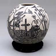 A black on white jar decorated with a sgraffito Day of the Dead at the Cemetery design
 by Alfredo Rodriguez of Mata Ortiz and Casas Grandes