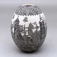 A black on white jar decorated with a sgraffito Native Americans on the Day of the Dead at the Cemetery and geometric design
 by Hector Javier Martinez of Mata Ortiz and Casas Grandes