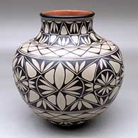 A polychrome jar decorated with a geometric design
 by Lisa Holt of Cochiti