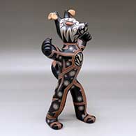 Standing polychrome coyote figure with earrings and a geometric design
 by Lisa Holt of Cochiti