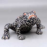 A polychrome frog figure decorated with a geometric design
 by Lisa Holt of Cochiti