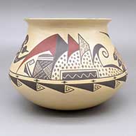 Polychrome jar with a flared opening and a sgraffito and painted geometric design, click or tap to see a larger version