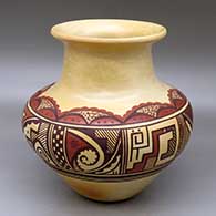 A polychrome jar with a rolled lip and decorated around the shoulder with a geometric design
 by Dee Setalla of Hopi