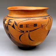 A large polychrome jar with a rolled, organic lip and decorated around the body with a bird element and geometric design
 by Nampeyo of Hano of Hopi