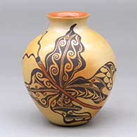 A small polychrome jar with a rolled lip and decorated with a butterfly design
 by Dextra of Hopi