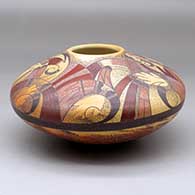 A polychrome seed pot decorated above the shoulder with a four panel bird element, hand and geometric design
 by Jacob Koopee of Hopi