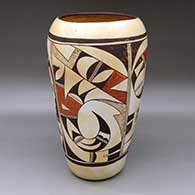 A large polychrome cylinder decorated around the body with a four panel bird element and geometric design
 by Paqua Naha aka 1st Frogwoman of Hopi