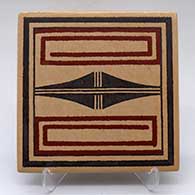 A polychrome tile decorated with a geometric design
 by Stetson Setalla of Hopi