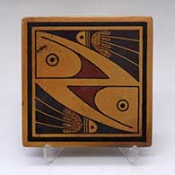 A polychrome tile decorated with a two panel bird element and geometric design
 by Stetson Setalla of Hopi