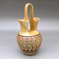 A polychrome wedding vase decorated with a migration pattern design and fire clouds
 by Tonita Nampeyo of Hopi